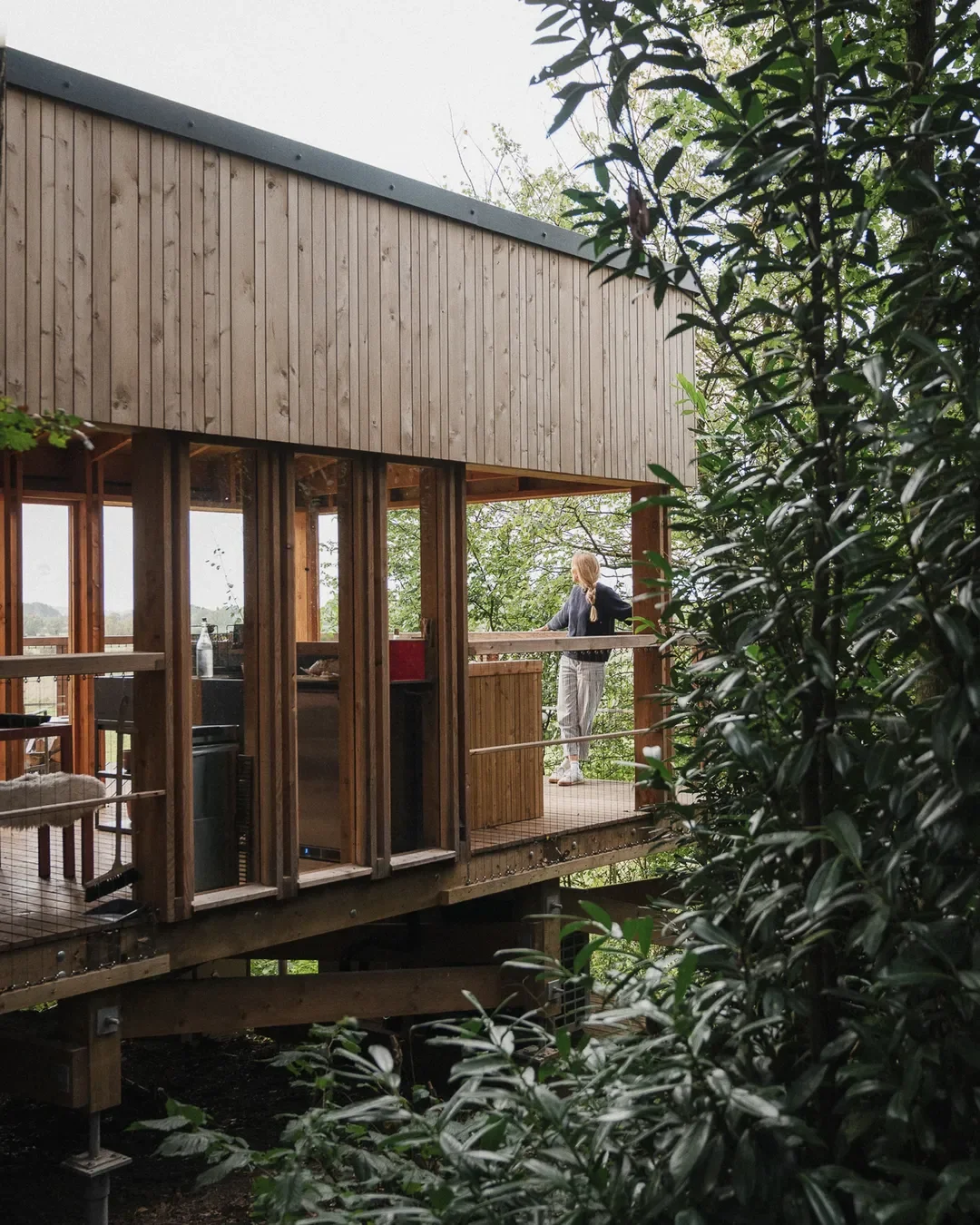 Vertical boards, fine rails and outdoor living.